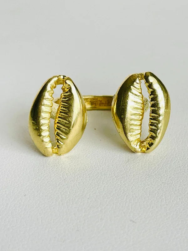 Women's rings futuristic-twist-The Floating Cowrie Ring in gold & silver